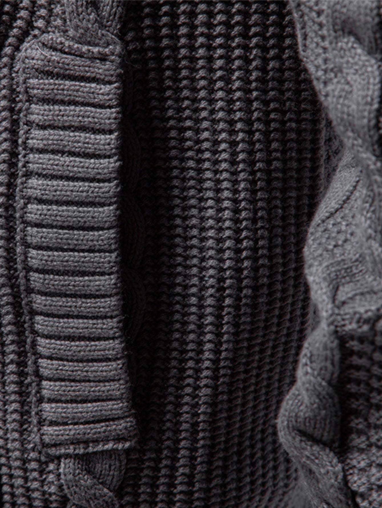 Pull à col montant zippé en jacquard twist