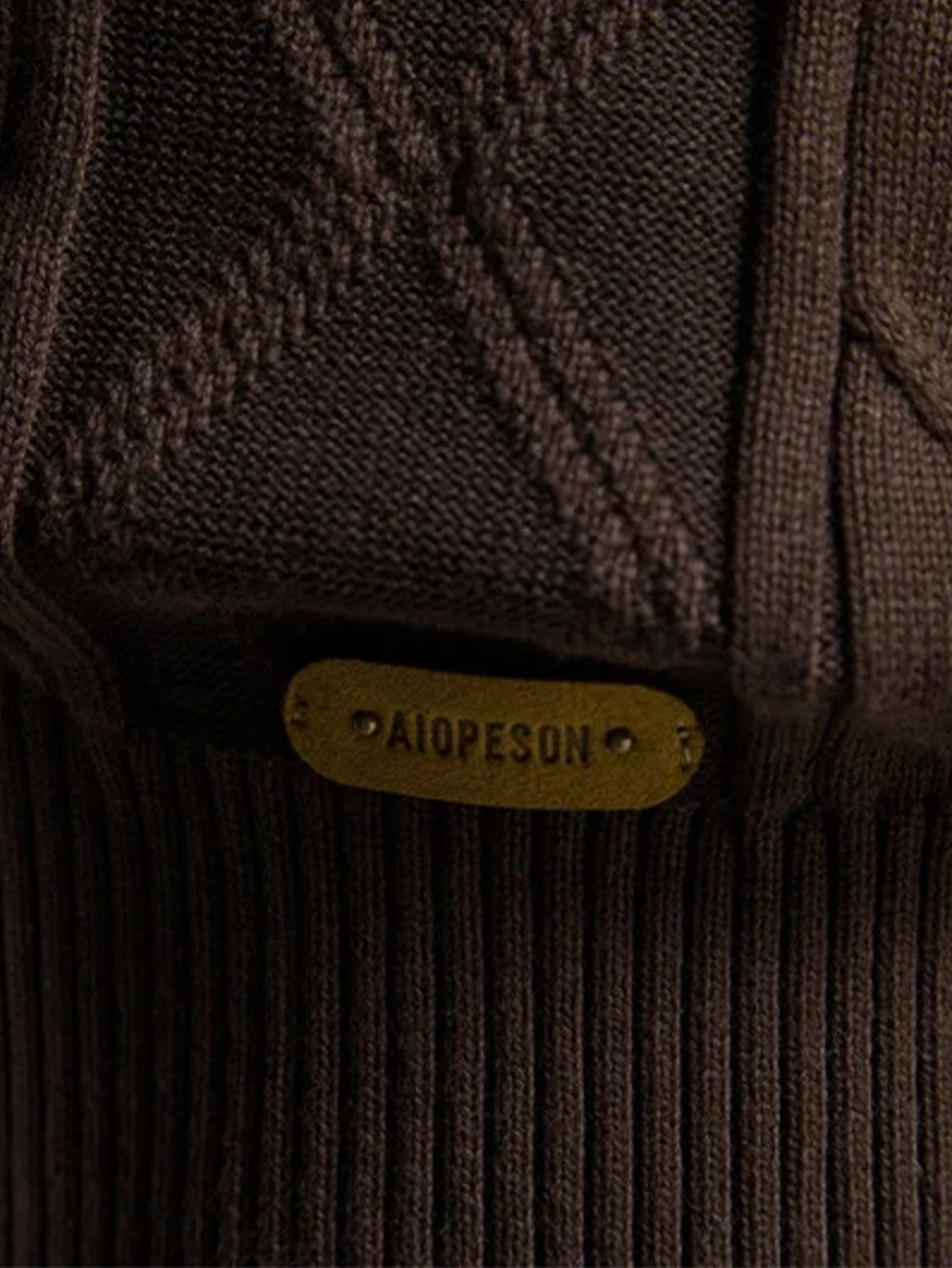 Gilet en jacquard géométrique à col châle