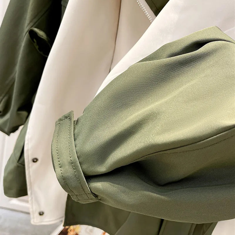 NATI | Veste à capuche en deux couches, fermée par des boutons-pression et une fermeture éclair
