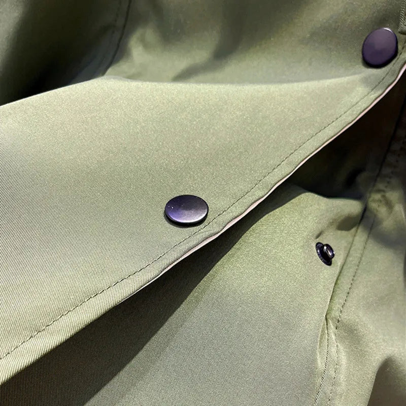 NATI | Veste à capuche en deux couches, fermée par des boutons-pression et une fermeture éclair