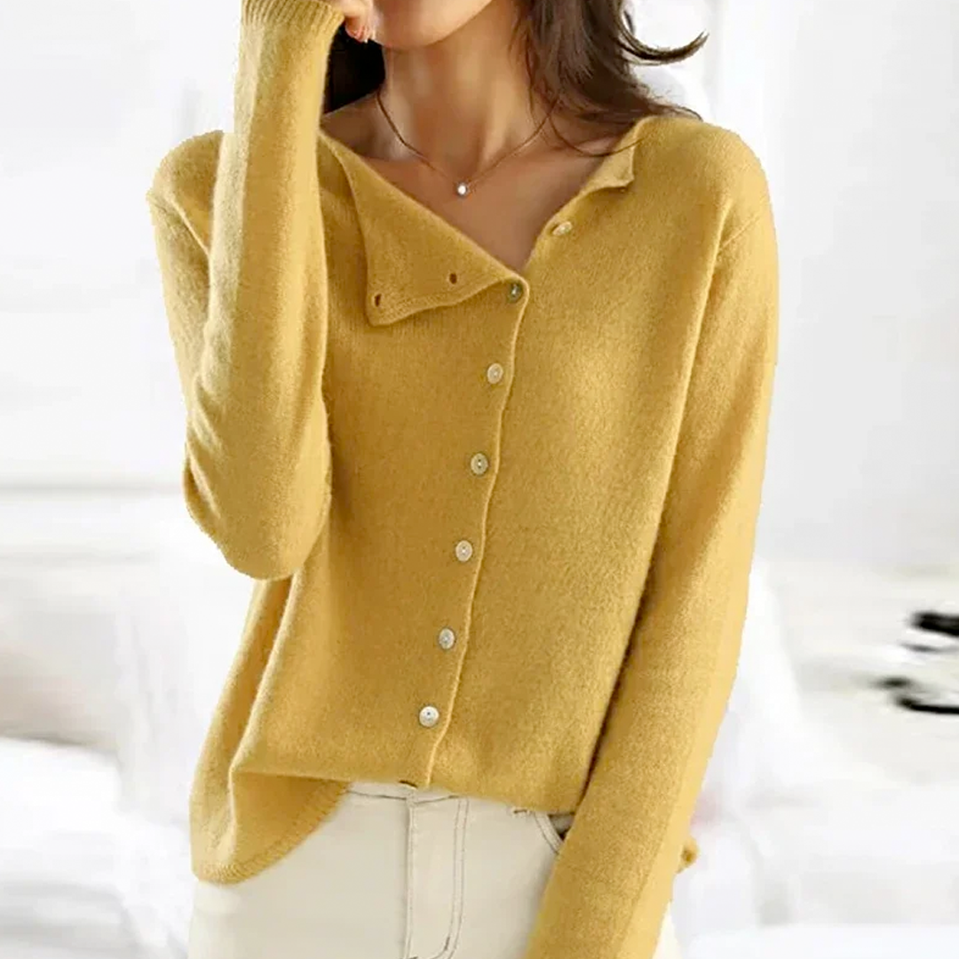 PULL AVEC BOUTONS SUR LES CÔTÉS