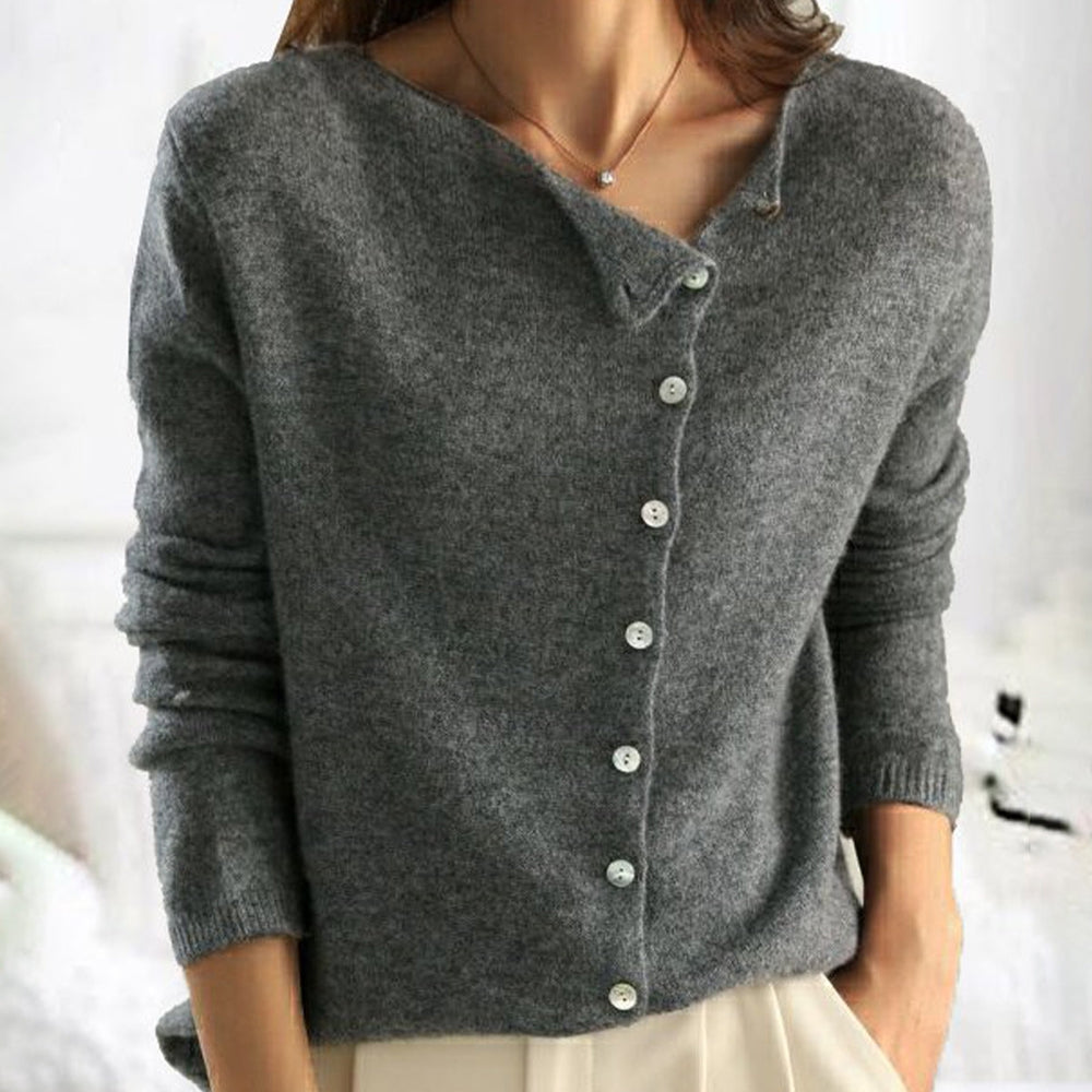 PULL AVEC BOUTONS SUR LES CÔTÉS